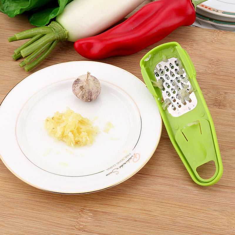 Garlic grater stainless steel teeth close-up