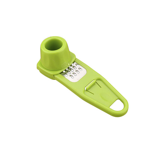 Lime green twist garlic grater with stainless steel grating plate